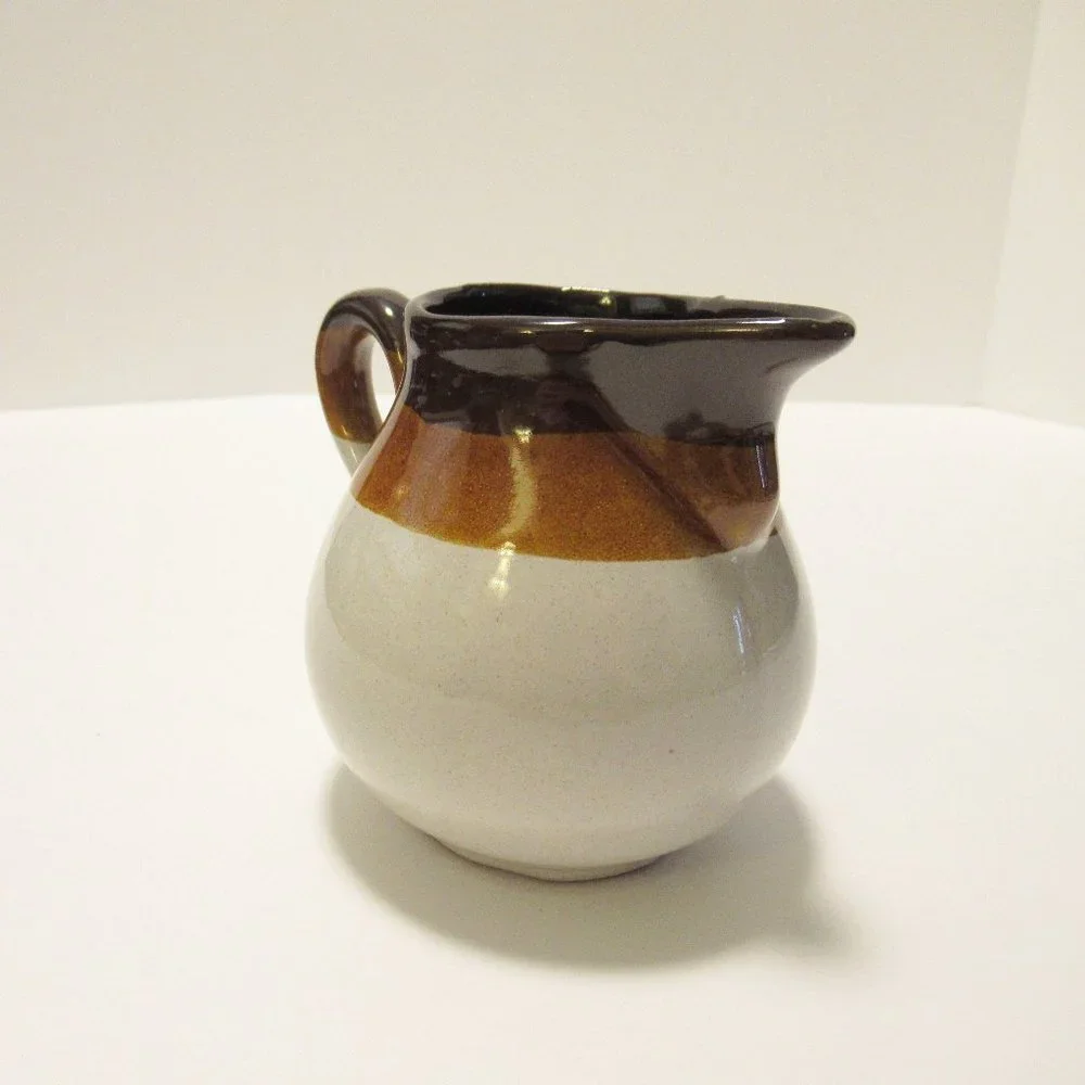Brown and White Ceramic Serveware Pitcher